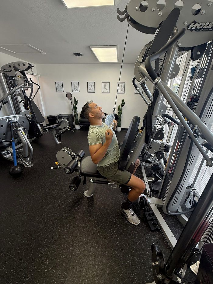 Pulling on the lat machine