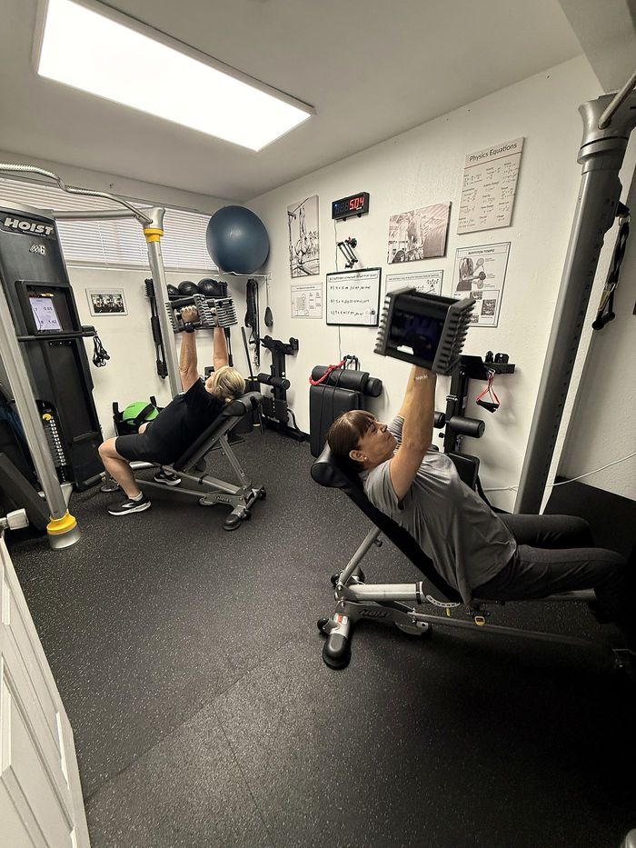 Two members pressing